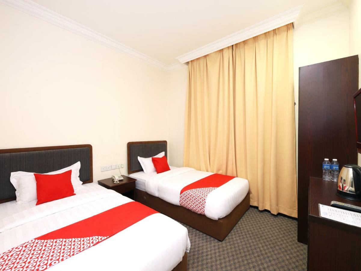 Oyo 750 Comfort Hotel Кота-Кинабалу Экстерьер фото