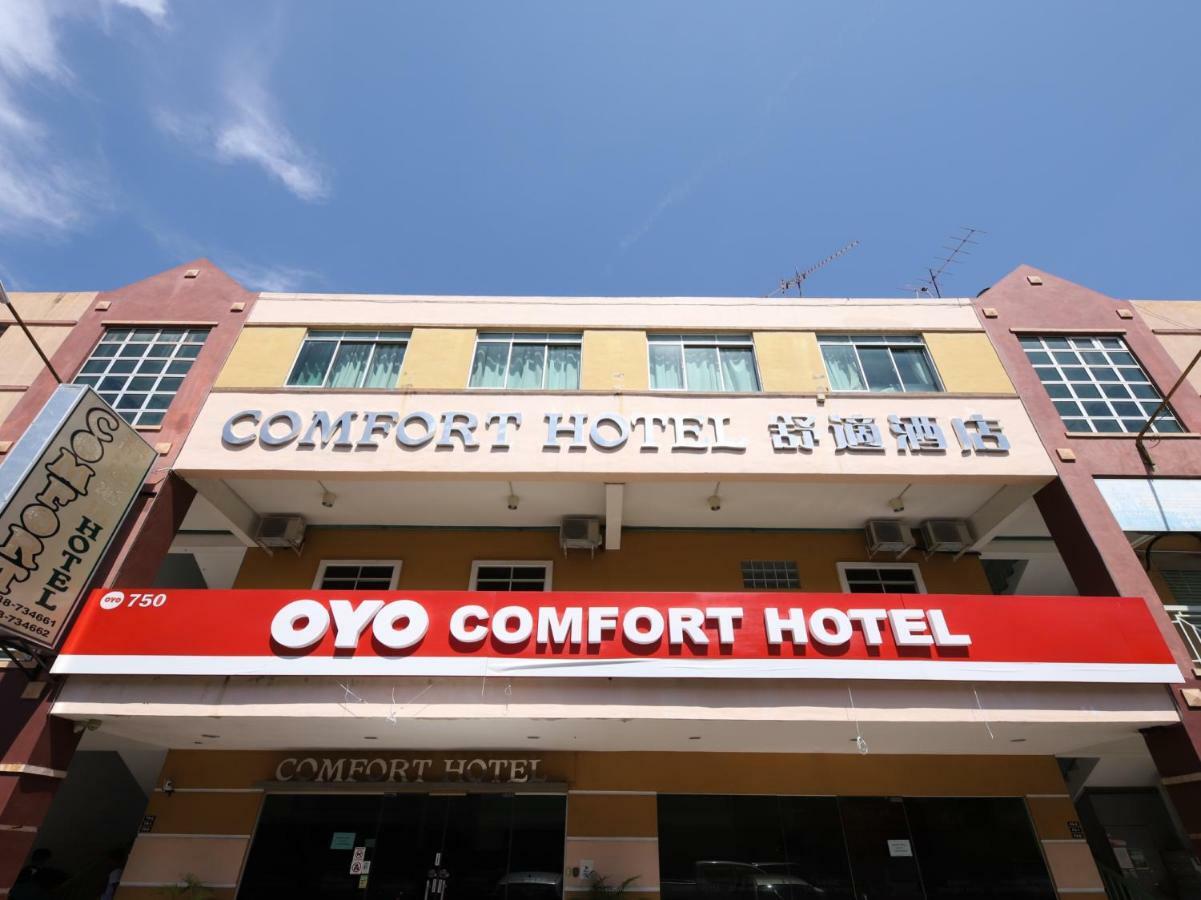 Oyo 750 Comfort Hotel Кота-Кинабалу Экстерьер фото