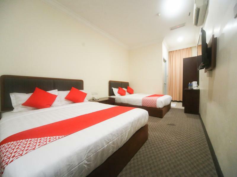 Oyo 750 Comfort Hotel Кота-Кинабалу Экстерьер фото