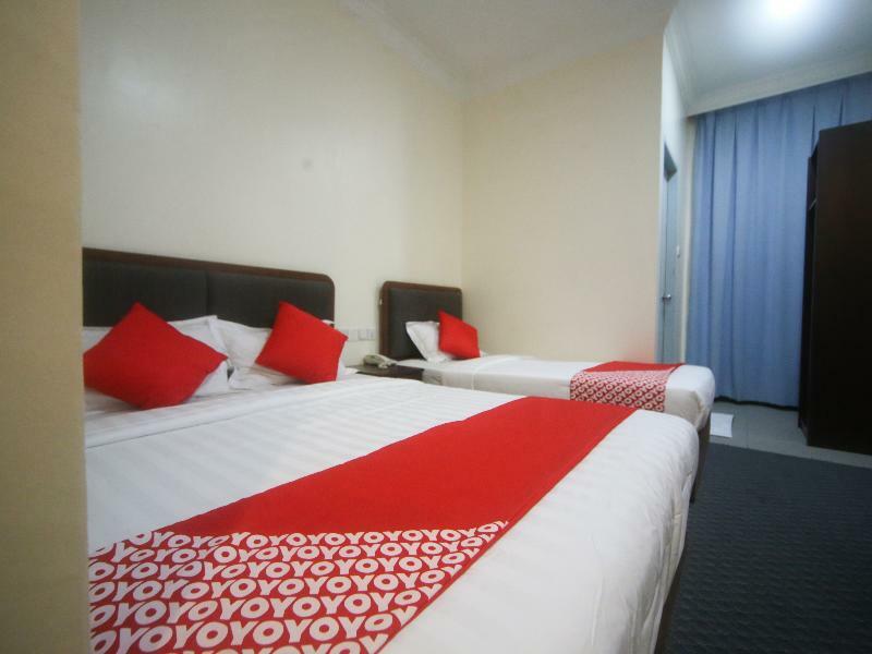 Oyo 750 Comfort Hotel Кота-Кинабалу Экстерьер фото